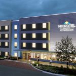 A computer mock up of the exterior of a microtel by wyndham